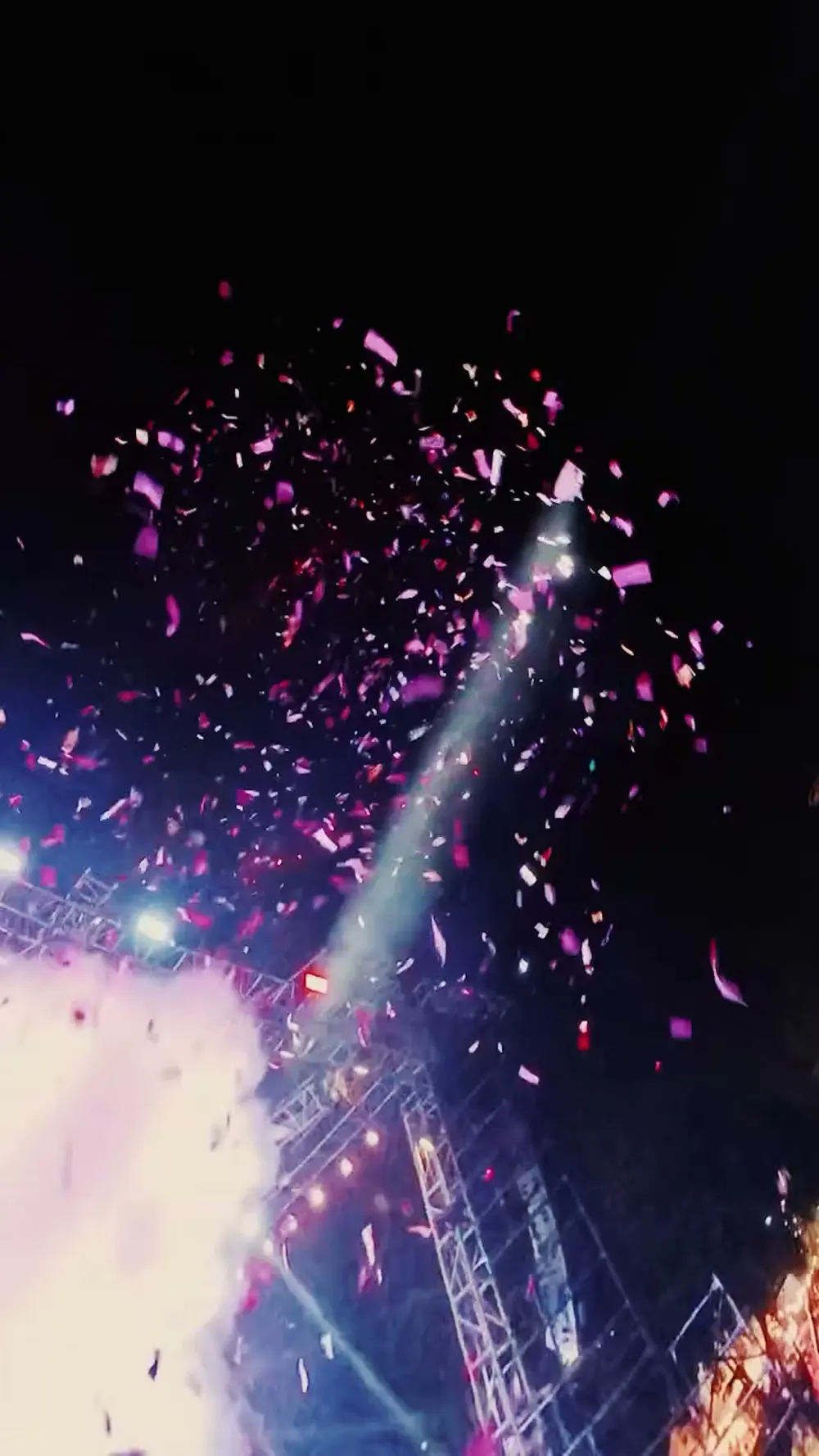 Confetti falling through stage lights